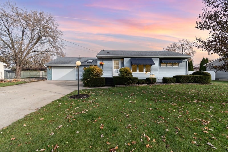 Single-story home at blue hour